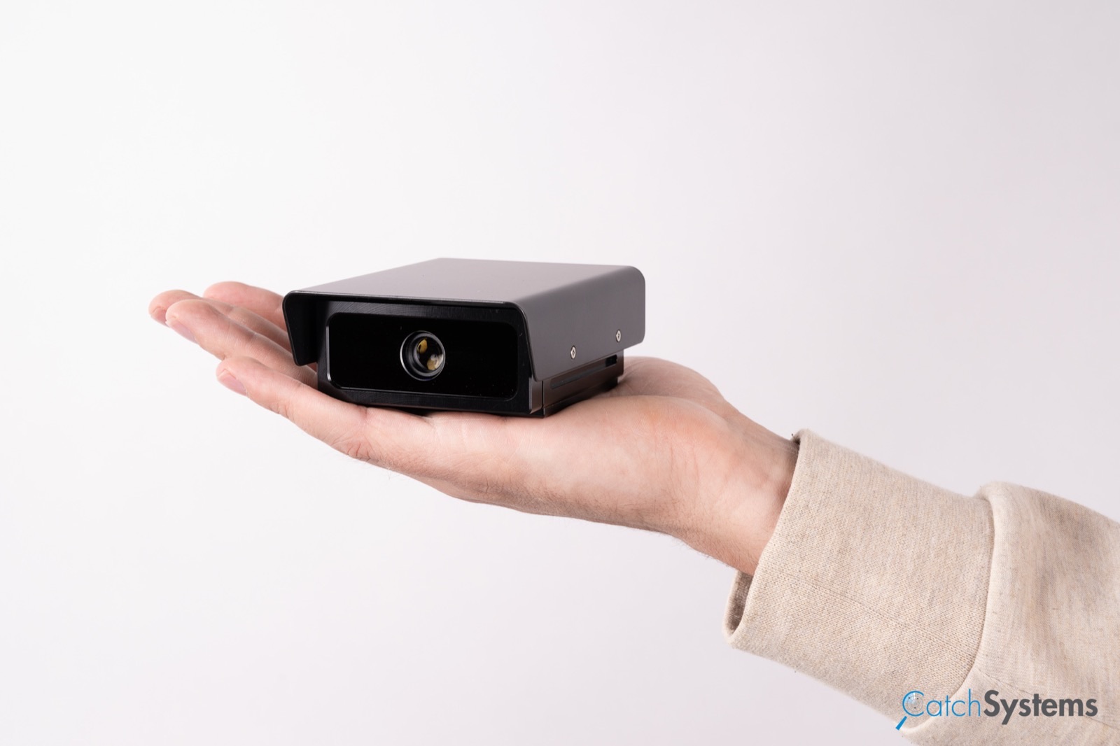 CatchCAM 2MP — compact ANPR/LPR camera held in hand